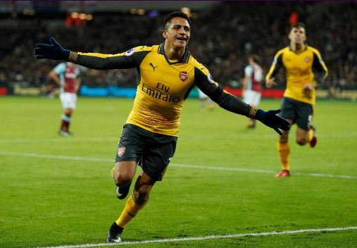 Sanchez treble keeps Arsenal in the hunt